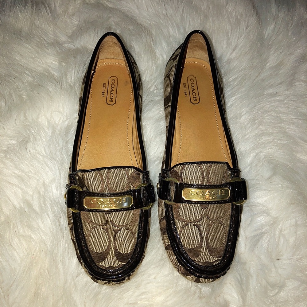 Coach logo loafers.